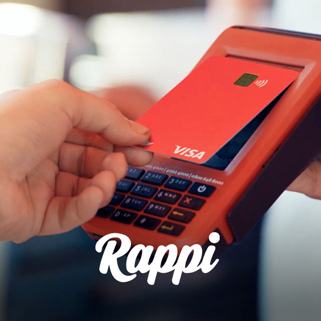 Person using Rappi card at point-of-sale, with Rappi logo at bottom of photo.