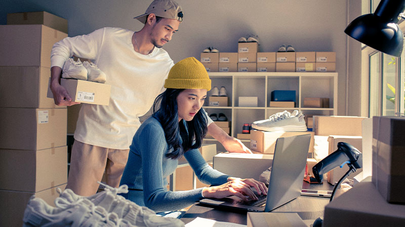 Men and Women in a warehouse