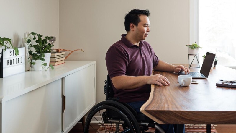 Man looking at laptop
