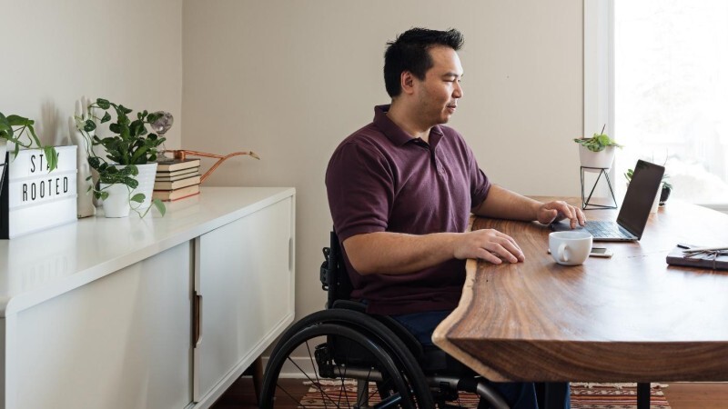 Man looking at laptop