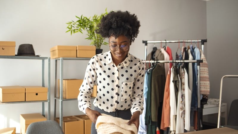 merchant folding clothes