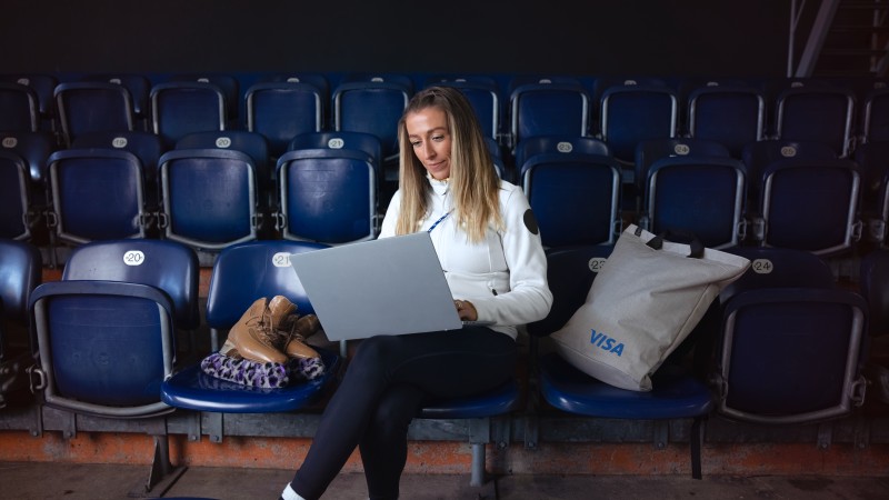 ice skater sitting in stands