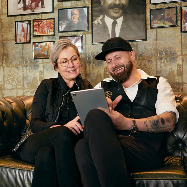 Barber on tablet