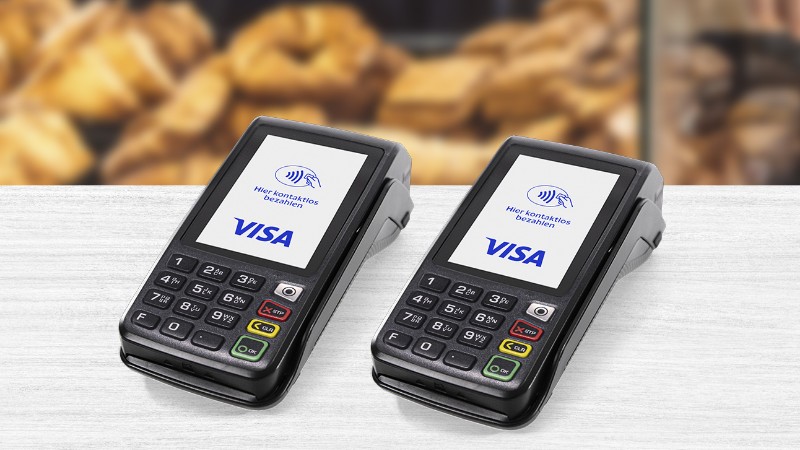 2 Payment terminals on a desk with Visa Logo
