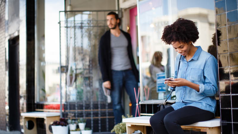 Woman outside shop