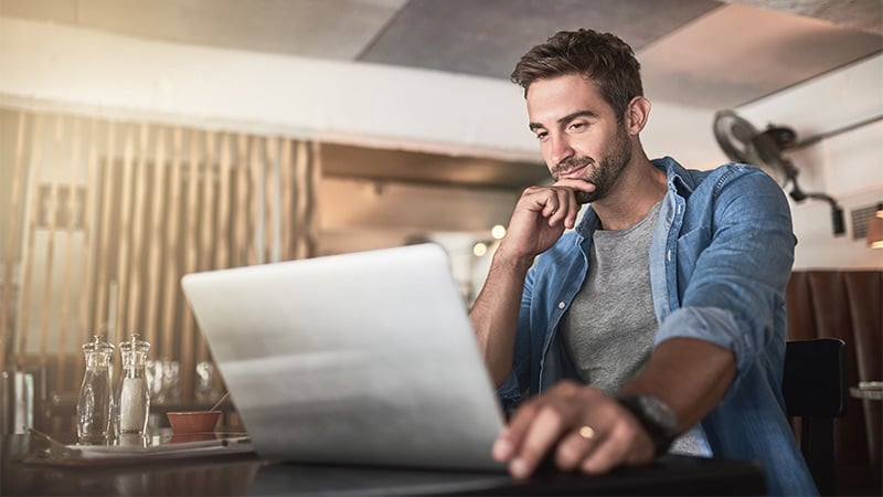 man using laptop