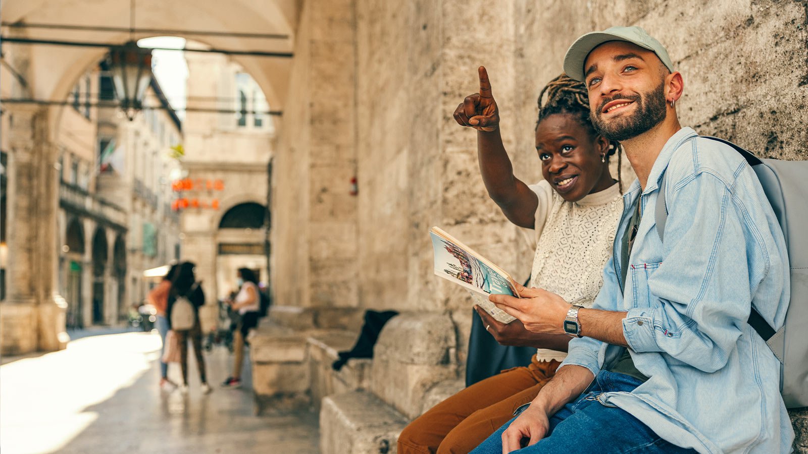 couple sat on wall